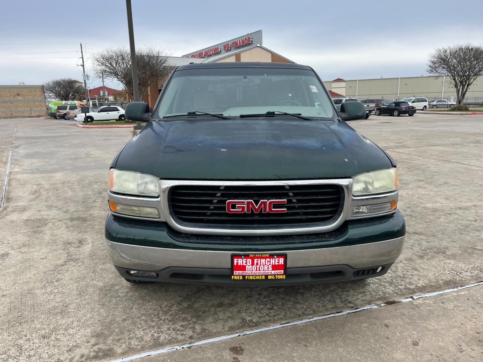 2004 green /TAN GMC Yukon 2WD (1GKEC13V94R) with an 4.8L V8 OHV 16V engine, 4-Speed Automatic Overdrive transmission, located at 14700 Tomball Parkway 249, Houston, TX, 77086, (281) 444-2200, 29.928619, -95.504074 - Photo #1